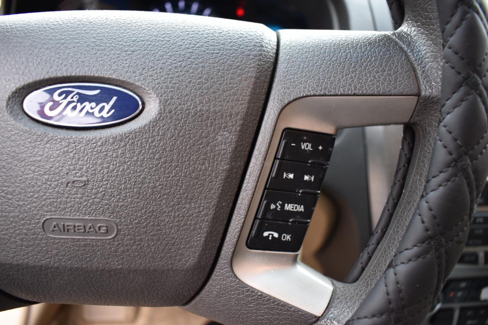 2012 Red /Gray Ford Fusion SE (3FAHP0HA0CR) with an 2.5L L4 DOHC 16V engine, 6 Speed AUTOMATIC transmission, located at 5925 E. BELKNAP ST., HALTOM CITY, TX, 76117, (817) 834-4222, 32.803799, -97.259003 - Photo#11